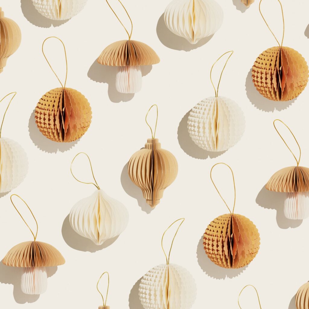 Stylish Paper Christmas Ornaments, hanging ivory beige New Year decorations as mushrooms, balls, flashlights, sunlight shadow, minimal aesthetic holiday flat lay, festive top view patterns background